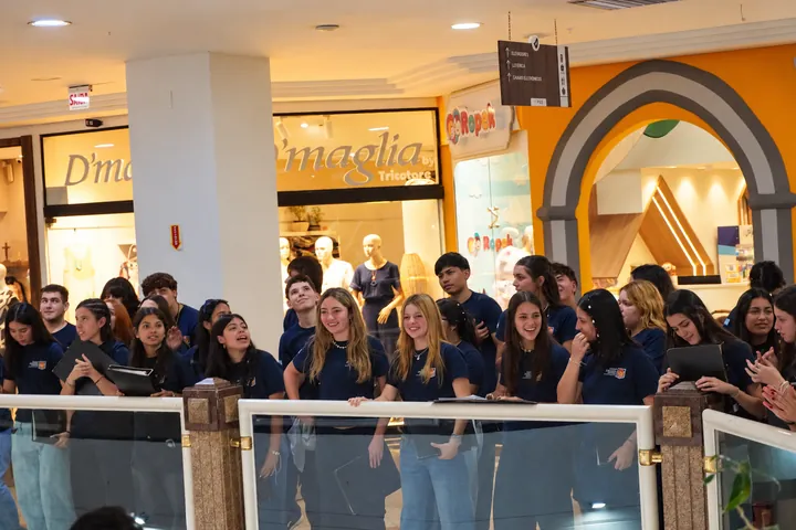 Choir members share a moment of joy.